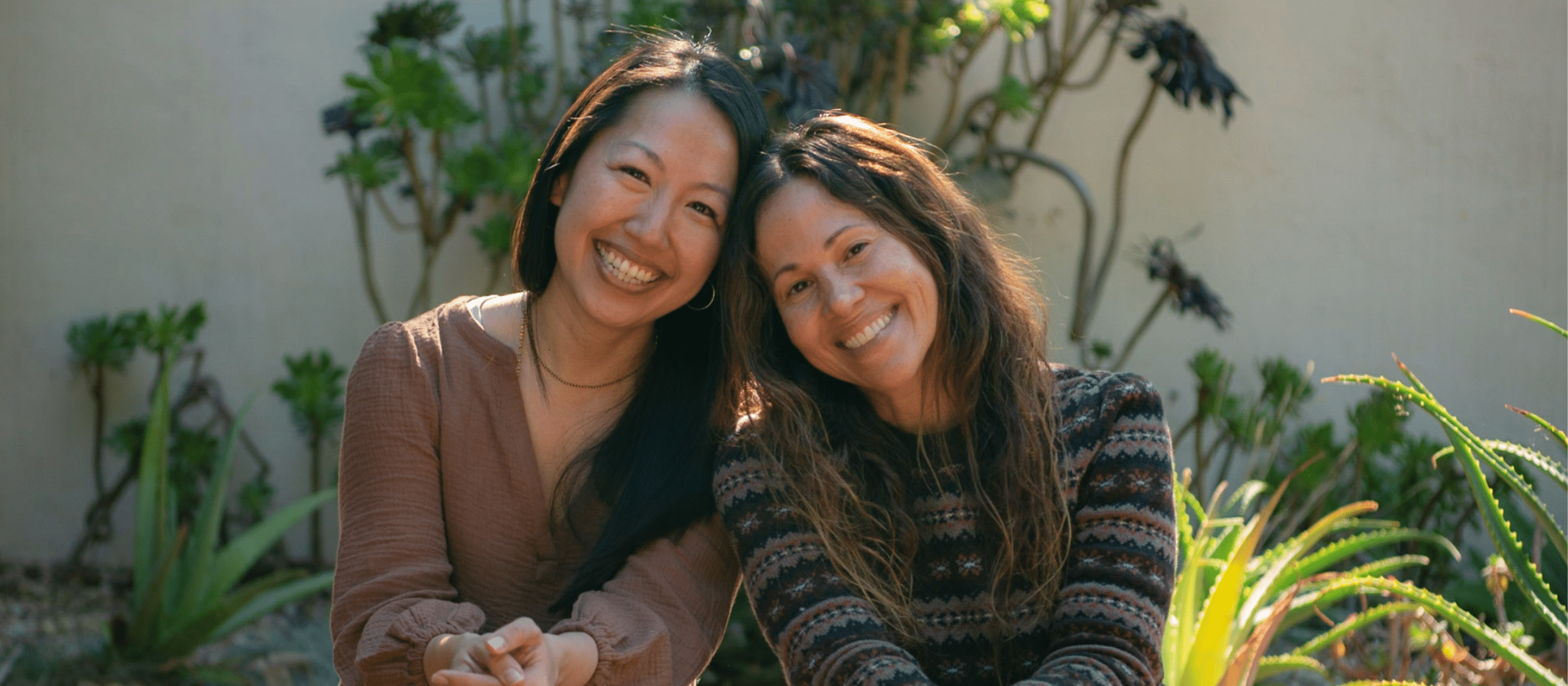 A couple of women smiling